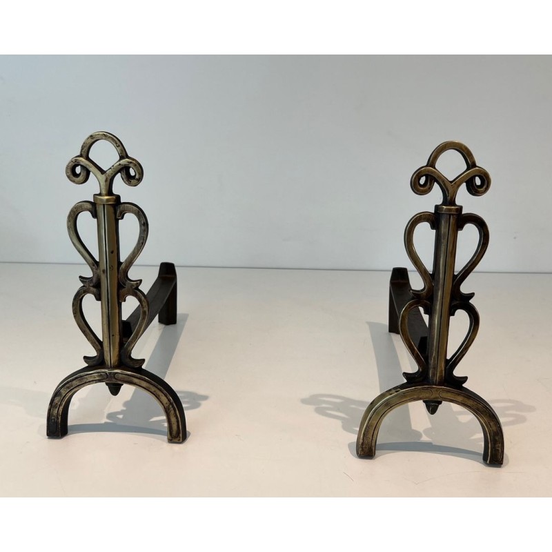 Pair of Brass and Iron Andirons with Triple-Scroll Finials and Lyre-Form Uprights, in the Style of Raymond Subes