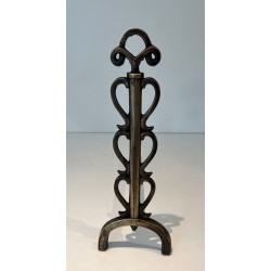 Pair of Brass and Iron Andirons with Stacked Scroll-Column Uprights on Arched Bases, in the Style of Raymond Subes