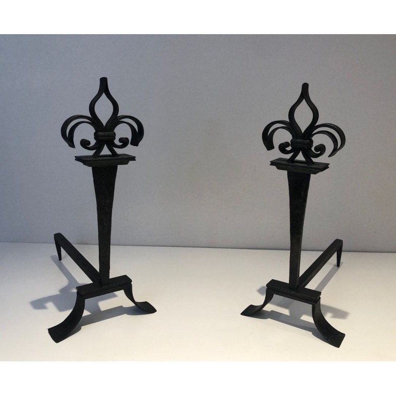 Important Pair of Wrought Iron Andirons with Heraldic Fleur-de-Lys Finials on Spreading Bases