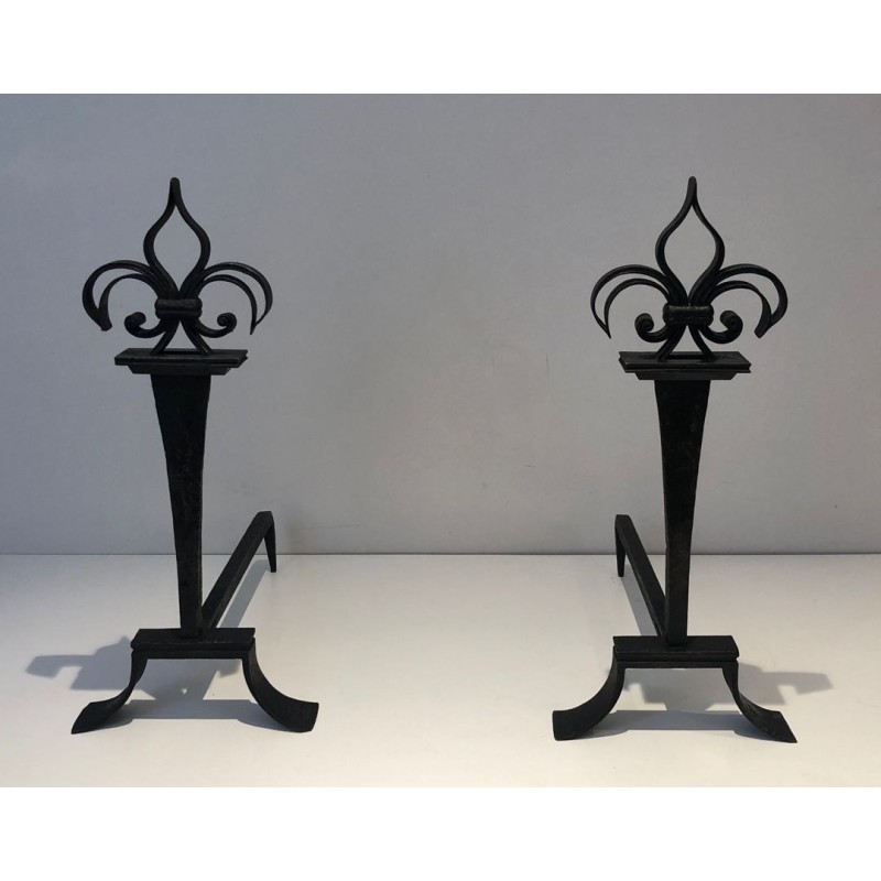 Important Pair of Wrought Iron Andirons with Heraldic Fleur-de-Lys Finials on Spreading Bases