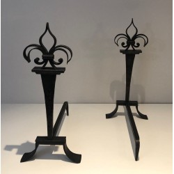 Important Pair of Wrought Iron Andirons with Heraldic Fleur-de-Lys Finials on Spreading Bases