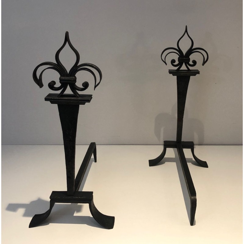 Important Pair of Wrought Iron Andirons with Heraldic Fleur-de-Lys Finials on Spreading Bases