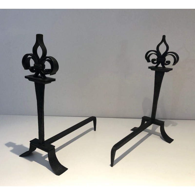 Important Pair of Wrought Iron Andirons with Heraldic Fleur-de-Lys Finials on Spreading Bases