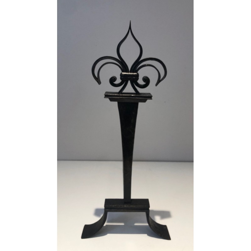 Important Pair of Wrought Iron Andirons with Heraldic Fleur-de-Lys Finials on Spreading Bases