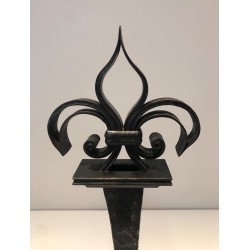 Important Pair of Wrought Iron Andirons with Heraldic Fleur-de-Lys Finials on Spreading Bases