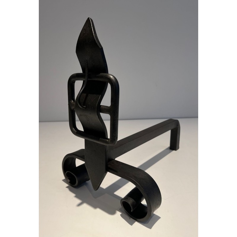 Pair of Wrought Iron Andirons with Obelisk Finials and Belt-and-Buckle Motifs on Scrolled Bases