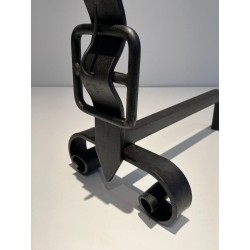 Pair of Wrought Iron Andirons with Obelisk Finials and Belt-and-Buckle Motifs on Scrolled Bases