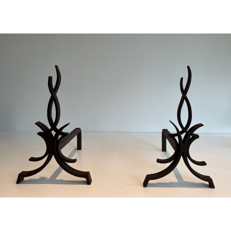 Pair of Wrought Iron Andirons with Stylised Flamboyant Uprights and Scrolled Feet, by Raymond Subes