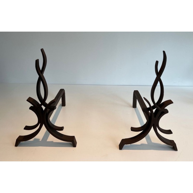 Pair of Wrought Iron Andirons with Stylised Flamboyant Uprights and Scrolled Feet, by Raymond Subes