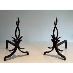 Pair of Wrought Iron Andirons with Stylised Flamboyant Uprights and Scrolled Feet, by Raymond Subes