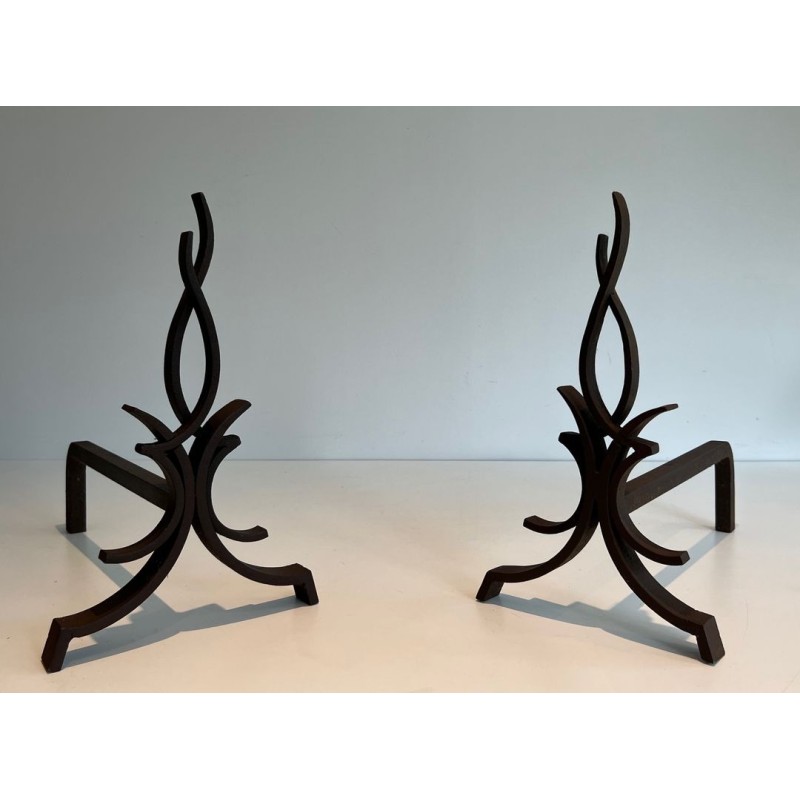 Pair of Wrought Iron Andirons with Stylised Flamboyant Uprights and Scrolled Feet, by Raymond Subes