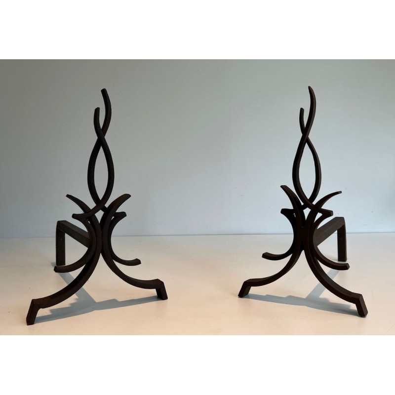 Pair of Wrought Iron Andirons with Stylised Flamboyant Uprights and Scrolled Feet, by Raymond Subes