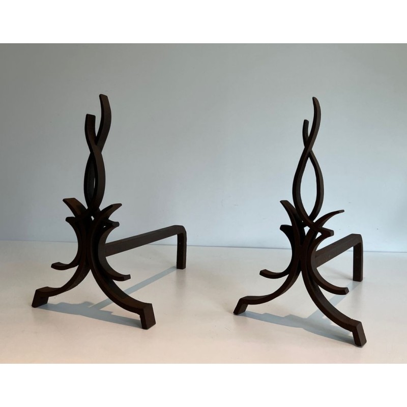 Pair of Wrought Iron Andirons with Stylised Flamboyant Uprights and Scrolled Feet, by Raymond Subes