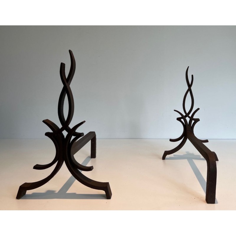 Pair of Wrought Iron Andirons with Stylised Flamboyant Uprights and Scrolled Feet, by Raymond Subes