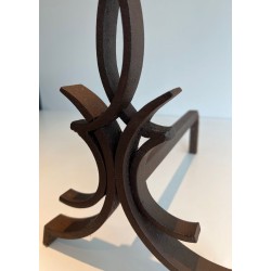 Pair of Wrought Iron Andirons with Stylised Flamboyant Uprights and Scrolled Feet, by Raymond Subes
