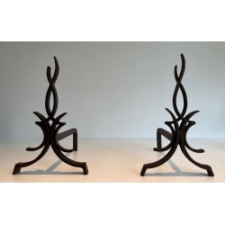 Pair of Wrought Iron Andirons with Stylised Flamboyant Uprights and Scrolled Feet, by Raymond Subes