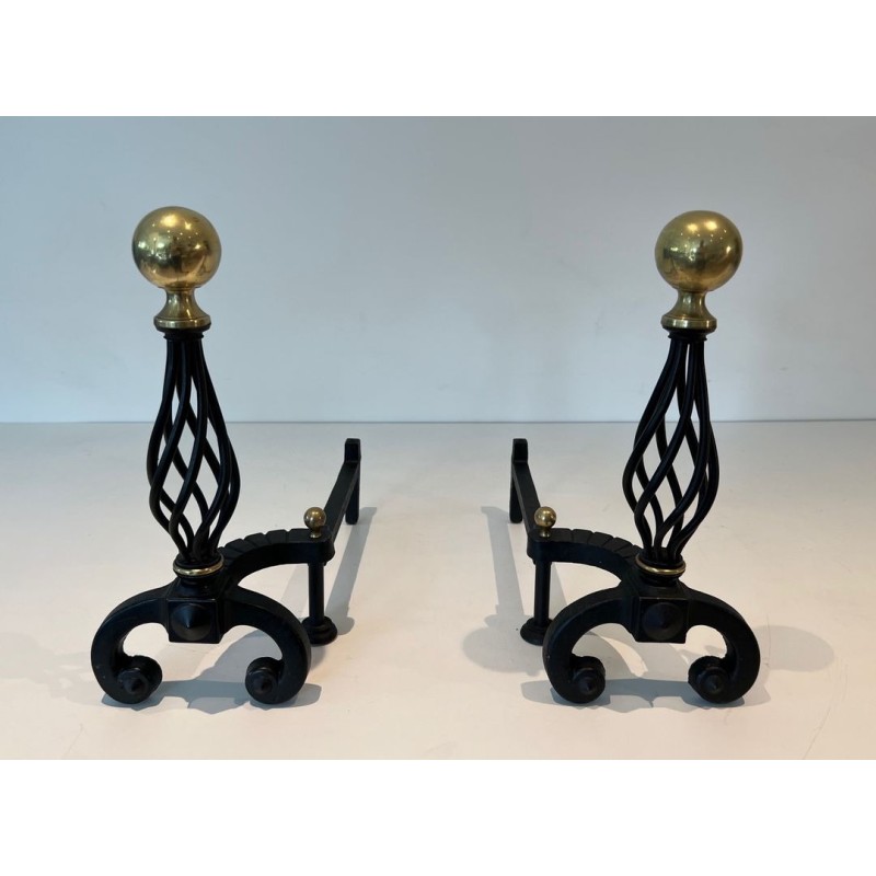 Pair of Wrought Iron Andirons with Spiral Cage Uprights and Brass Ball Finials. France. Circa 1970.