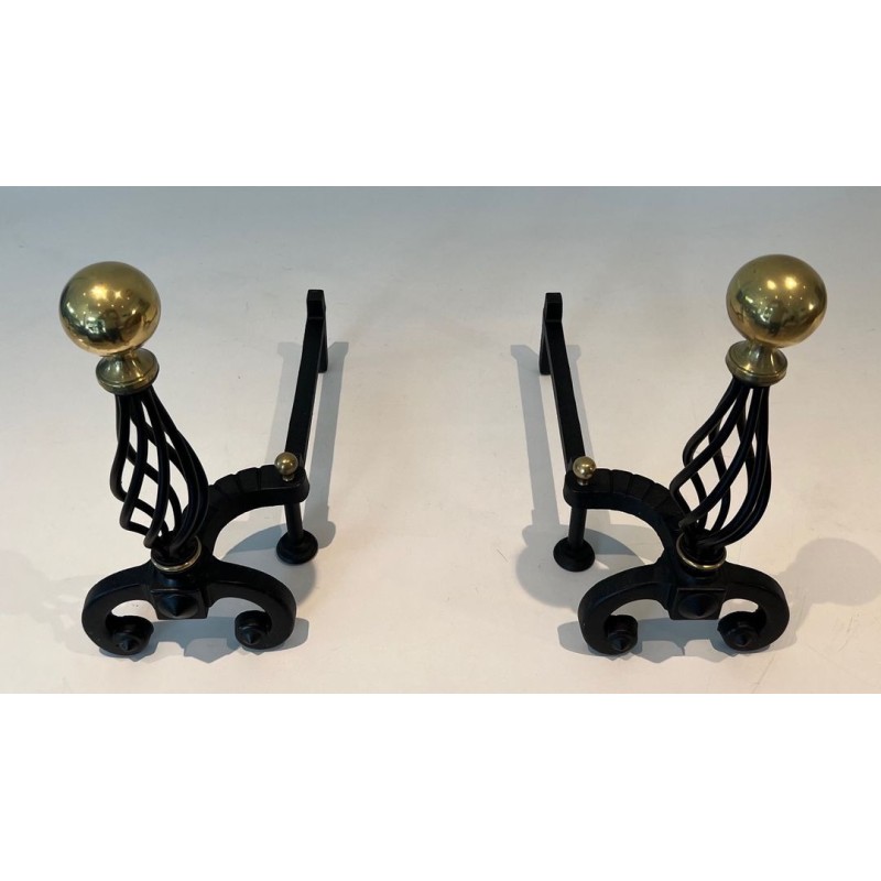 Pair of Wrought Iron Andirons with Spiral Cage Uprights and Brass Ball Finials. France. Circa 1970.