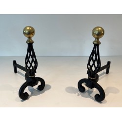 Pair of Wrought Iron Andirons with Spiral Cage Uprights and Brass Ball Finials. France. Circa 1970.