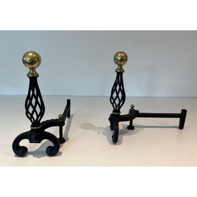 Pair of Wrought Iron Andirons with Spiral Cage Uprights and Brass Ball Finials. France. Circa 1970.