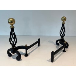 Pair of Wrought Iron Andirons with Spiral Cage Uprights and Brass Ball Finials. France. Circa 1970.