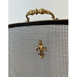 Neoclassical Style Three-Panel Expanded Steel Mesh Fireplace Screen with Brass Fleur-de-Lys. France. Circa 1940.