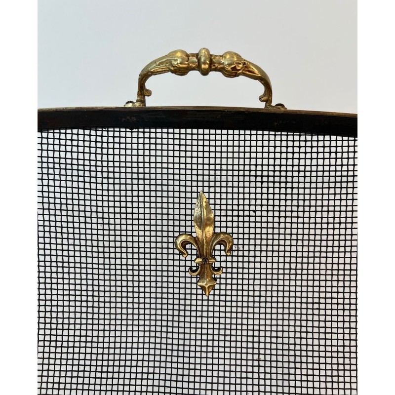 Neoclassical Style Three-Panel Expanded Steel Mesh Fireplace Screen with Brass Fleur-de-Lys. France. Circa 1940.
