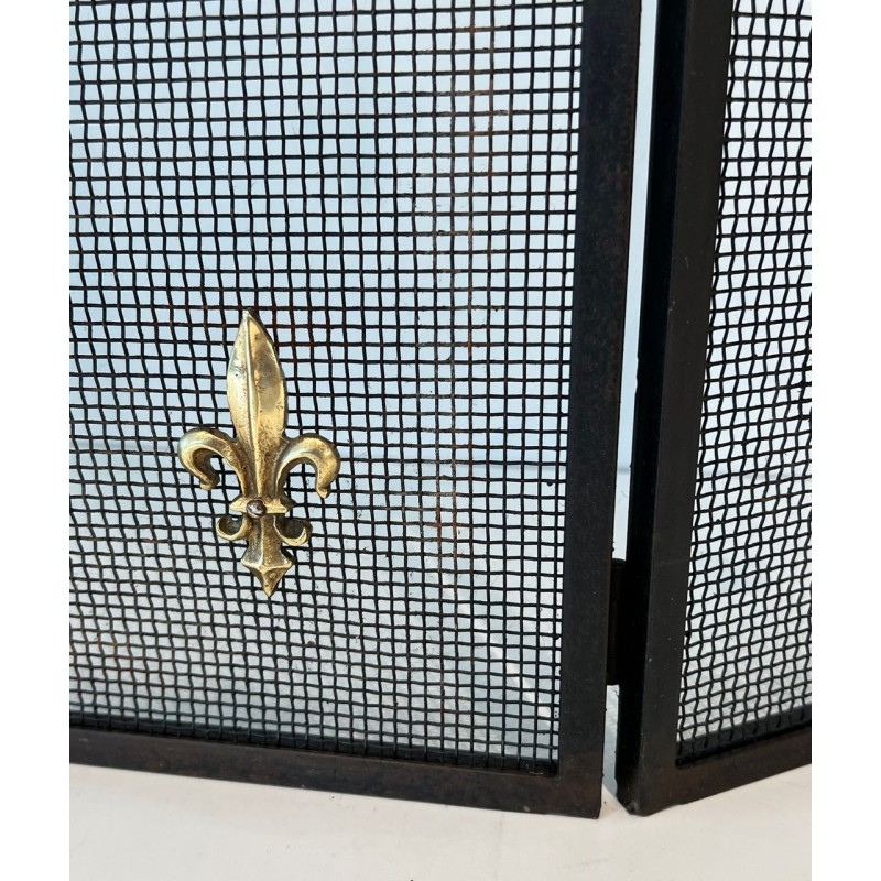 Neoclassical Style Three-Panel Expanded Steel Mesh Fireplace Screen with Brass Fleur-de-Lys. France. Circa 1940.
