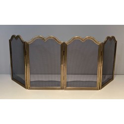 Neoclassical Style Four-Panel Brass and Steel Mesh Fireplace Screen with Scalloped Crest Rails. France. Circa 1970.