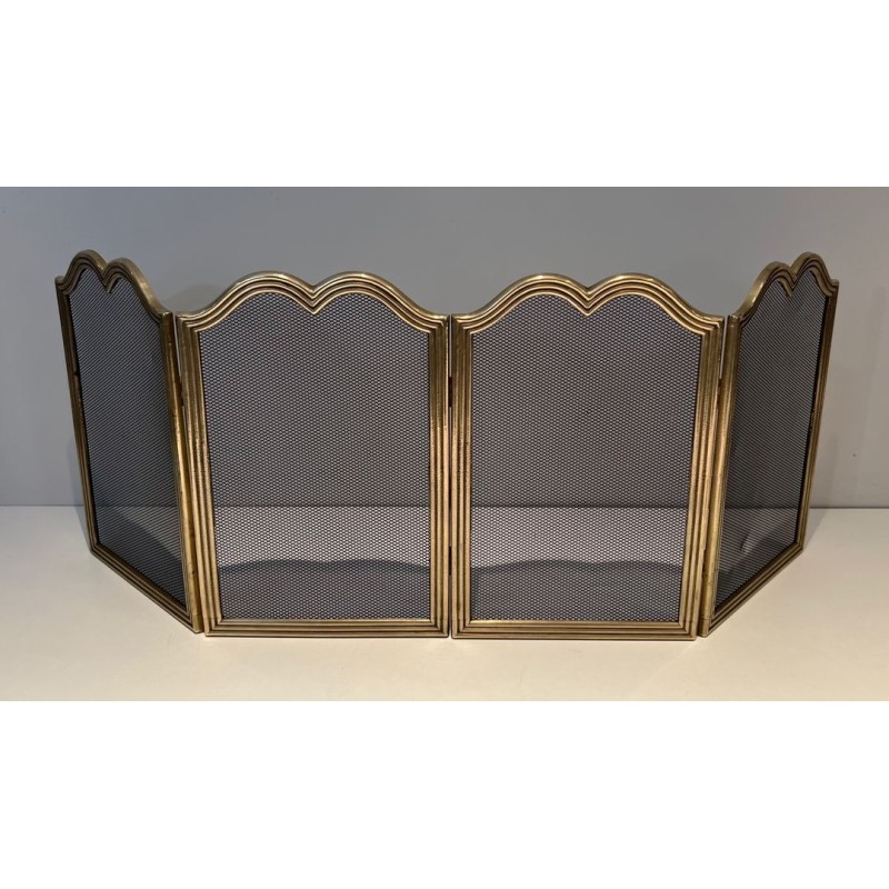 Neoclassical Style Four-Panel Brass and Steel Mesh Fireplace Screen with Scalloped Crest Rails. France. Circa 1970.