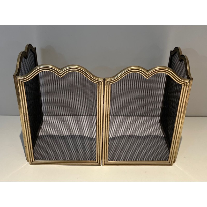 Neoclassical Style Four-Panel Brass and Steel Mesh Fireplace Screen with Scalloped Crest Rails. France. Circa 1970.
