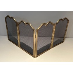 Neoclassical Style Four-Panel Brass and Steel Mesh Fireplace Screen with Scalloped Crest Rails. France. Circa 1970.