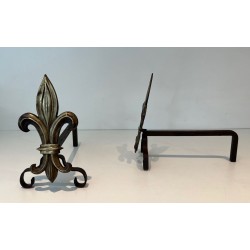 Pair of Bronze and Wrought Iron Andirons with Fleur-de-Lys Uprights. France. Circa 1940.