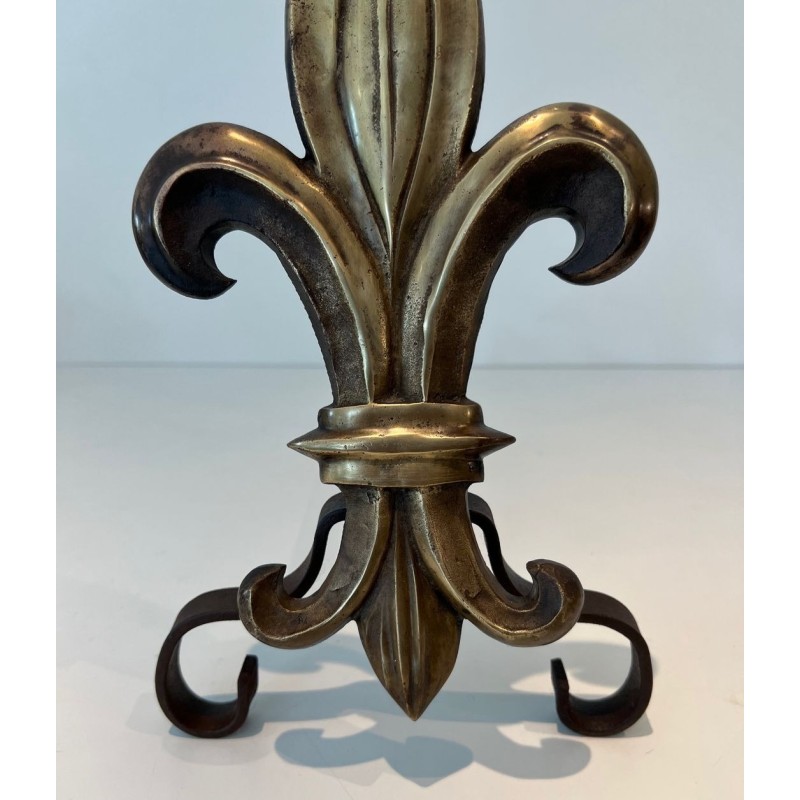 Pair of Bronze and Wrought Iron Andirons with Fleur-de-Lys Uprights. France. Circa 1940.