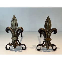 Pair of Bronze and Wrought Iron Andirons with Fleur-de-Lys Uprights. France. Circa 1940.