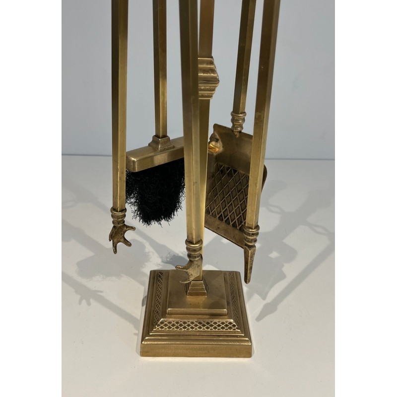 Neoclassical Style Finely Chased Bronze and Brass Fireplace Companion Set with Reticulated Ball Finials. France. Circa 1930.