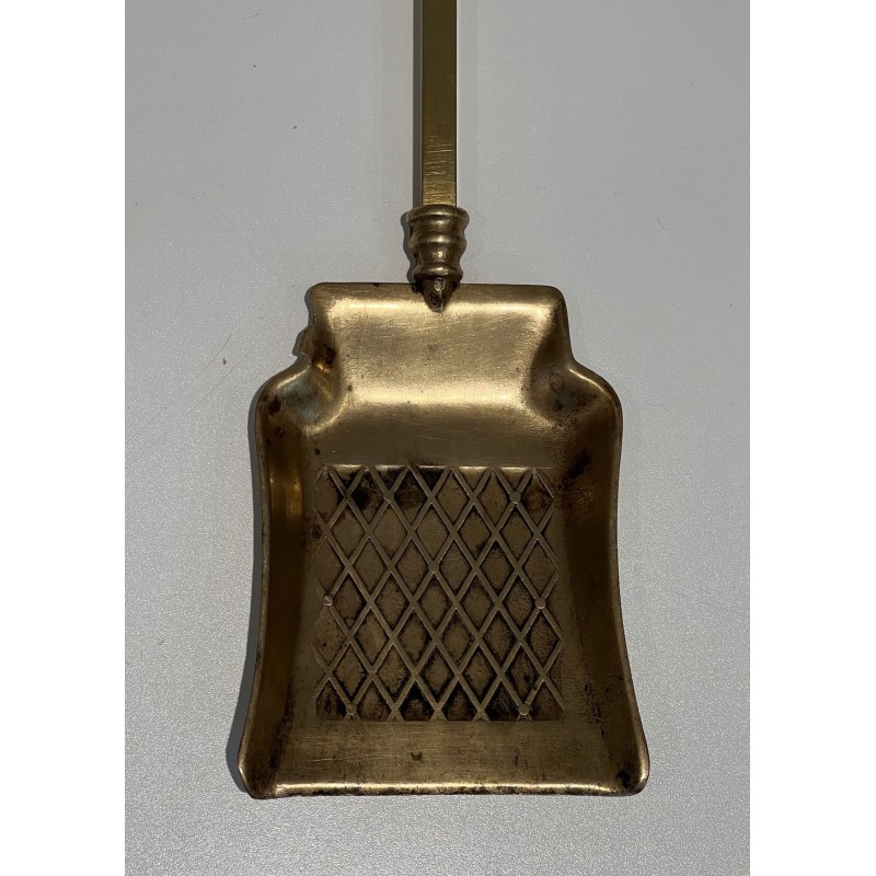 Neoclassical Style Finely Chased Bronze and Brass Fireplace Companion Set with Reticulated Ball Finials. France. Circa 1930.