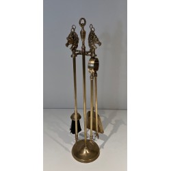 Neoclassical Style Brass Fireplace Companion Set with Horse Head Finials, in the Manner of Maison Jansen. France. Circa 1950.