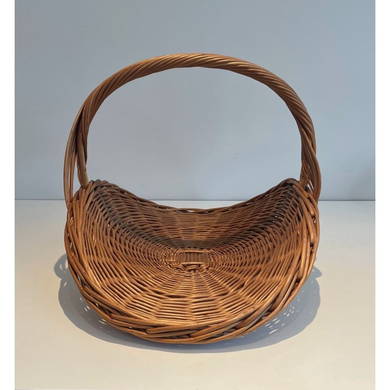 Rattan Wicker Log Basket of D-Shaped Form with Arched Carrying Handle. France. Circa 1970.