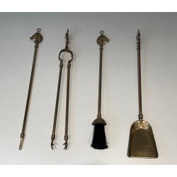 Neoclassical Style Brass Fireplace Companion Set with Horse Head Finials, in the Manner of Maison Jansen. France. Circa 1950.