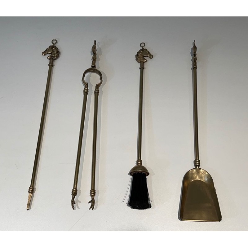 Neoclassical Style Brass Fireplace Companion Set with Horse Head Finials, in the Manner of Maison Jansen. France. Circa 1950.
