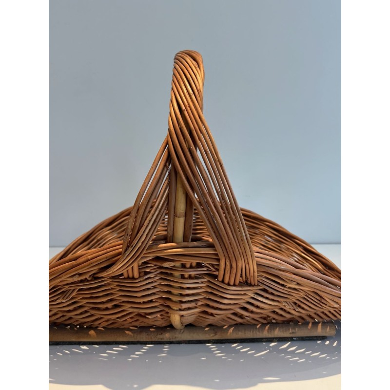 Rattan Wicker Log Basket of D-Shaped Form with Arched Carrying Handle. France. Circa 1970.