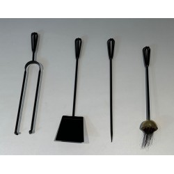 Design Fireplace Companion Set in Black Lacquered Metal and Polished Brass. France. Circa 1970.
