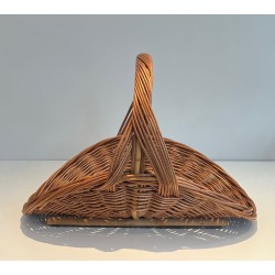 Rattan Wicker Log Basket of D-Shaped Form with Arched Carrying Handle. France. Circa 1970.