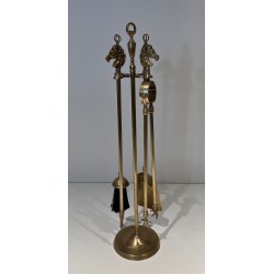 Neoclassical Style Brass Fireplace Companion Set with Horse Head Finials, in the Manner of Maison Jansen. France. Circa 1950.