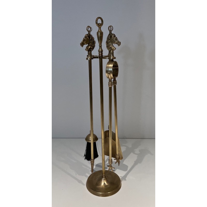 Neoclassical Style Brass Fireplace Companion Set with Horse Head Finials, in the Manner of Maison Jansen. France. Circa 1950.