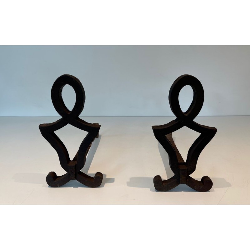 Pair of Modernist Cast Iron Andirons with Stylised Figural Uprights, by Raymond Subes. France. Circa 1940.