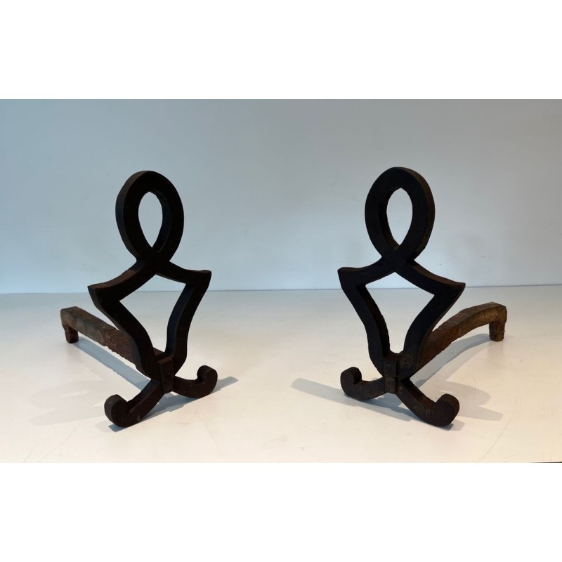 Pair of Modernist Cast Iron Andirons with Stylised Figural Uprights, by Raymond Subes. France. Circa 1940.