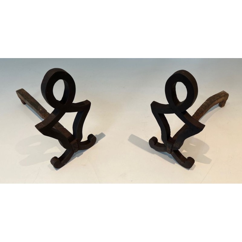 Pair of Modernist Cast Iron Andirons with Stylised Figural Uprights, by Raymond Subes. France. Circa 1940.