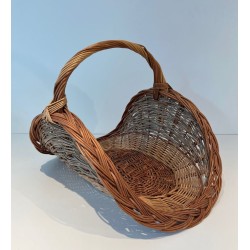 Rattan Wicker Log Basket of Boat Form with Arched Carrying Handle. France. Circa 1970.